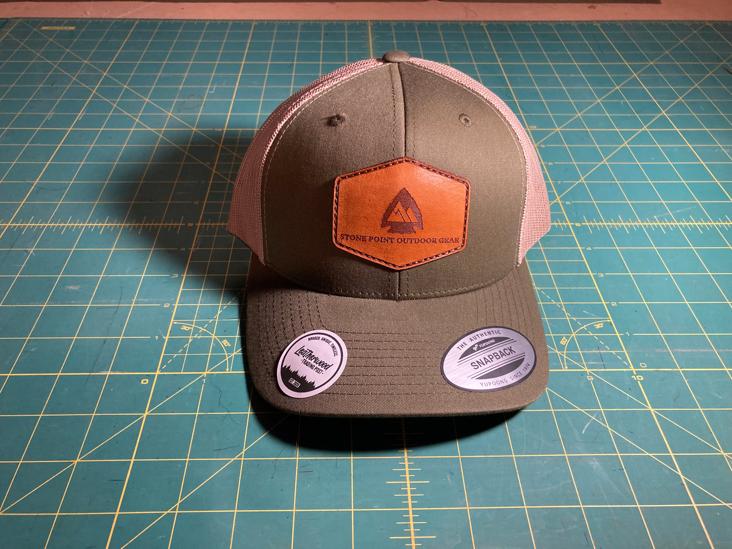 Green Leather Patch Trucker Hat