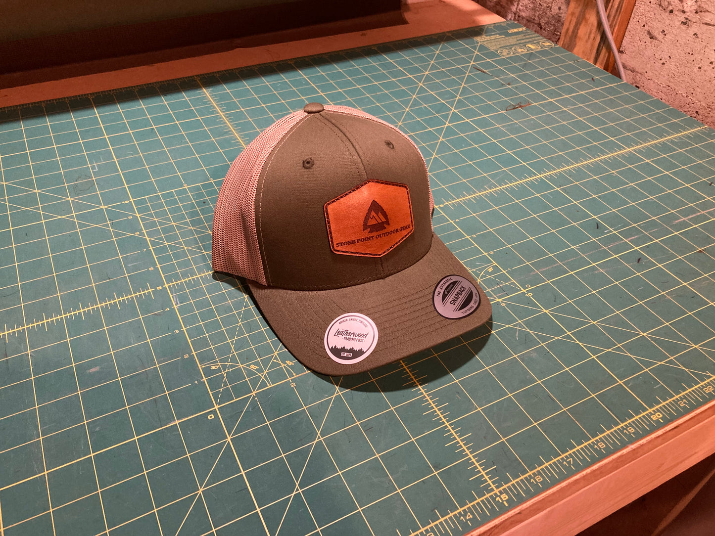 Green Leather Patch Trucker Hat