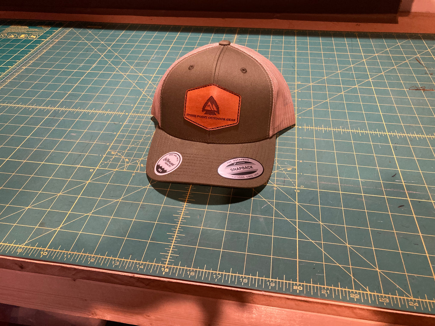 Green Leather Patch Trucker Hat